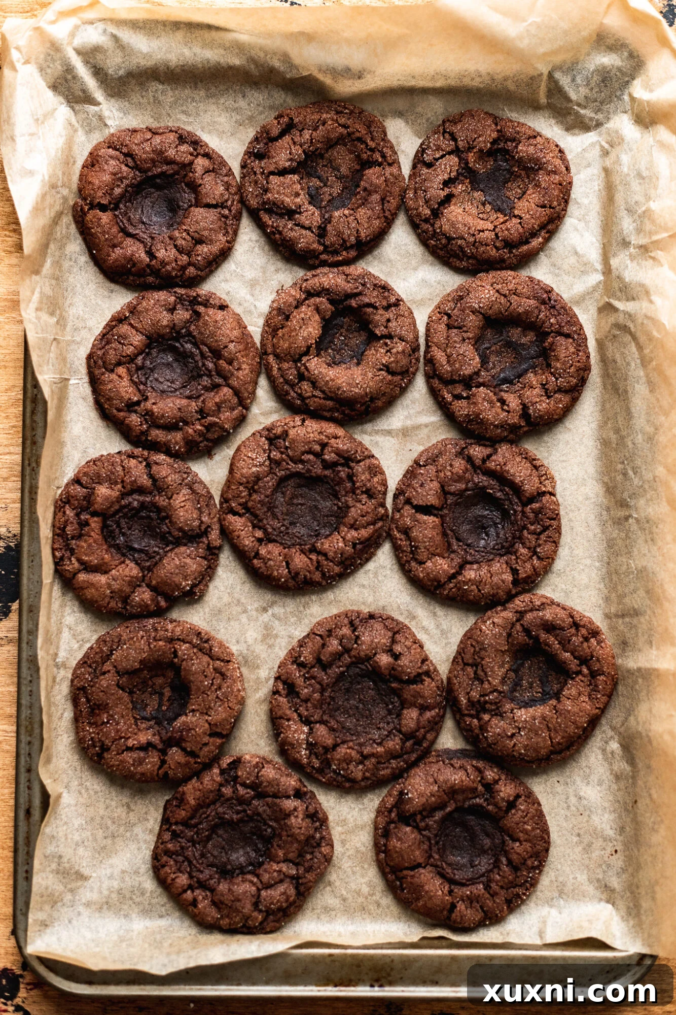 Freshly baked vegan thumbprint cookies with perfect indentations