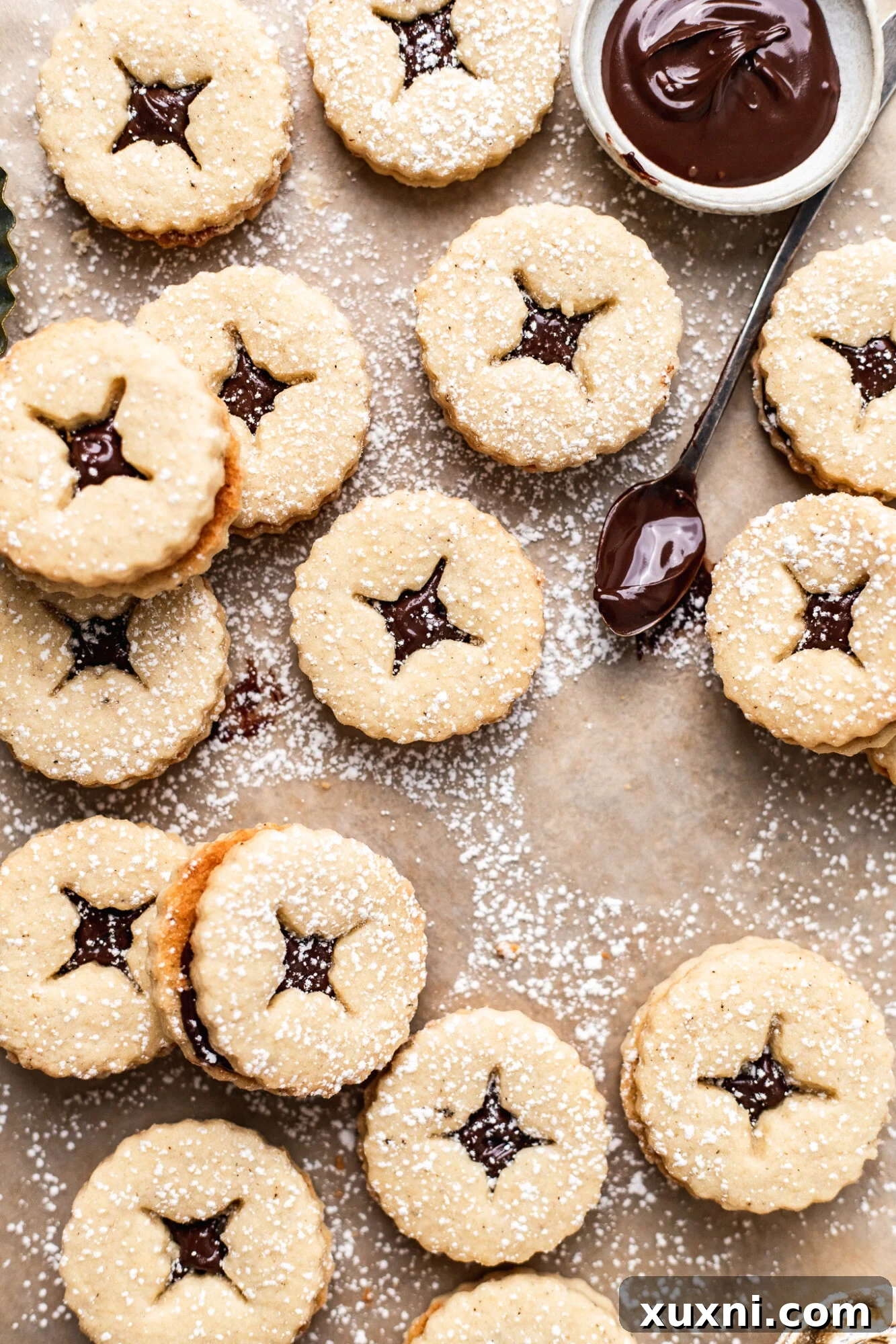 Easy & Soft Vegan Nutella Linzer Cookie Recipe, filled with vegan chocolate hazelnut spread