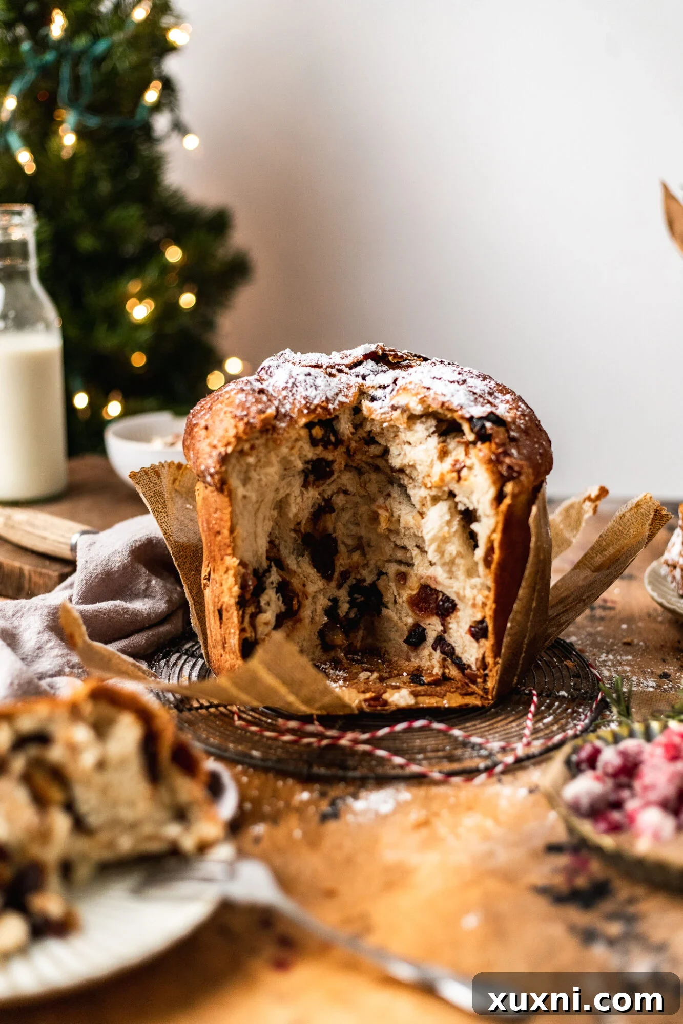 Sliced vegan panettone showing its airy texture and fruit