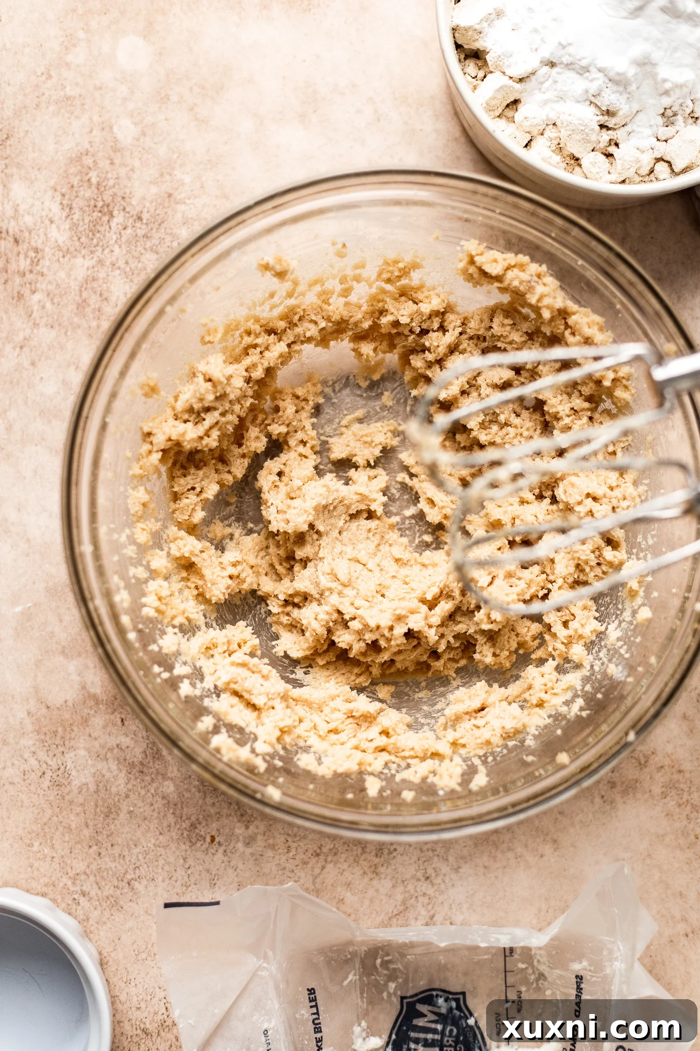 creaming together the vegan butter and sugar for oat flour cookies