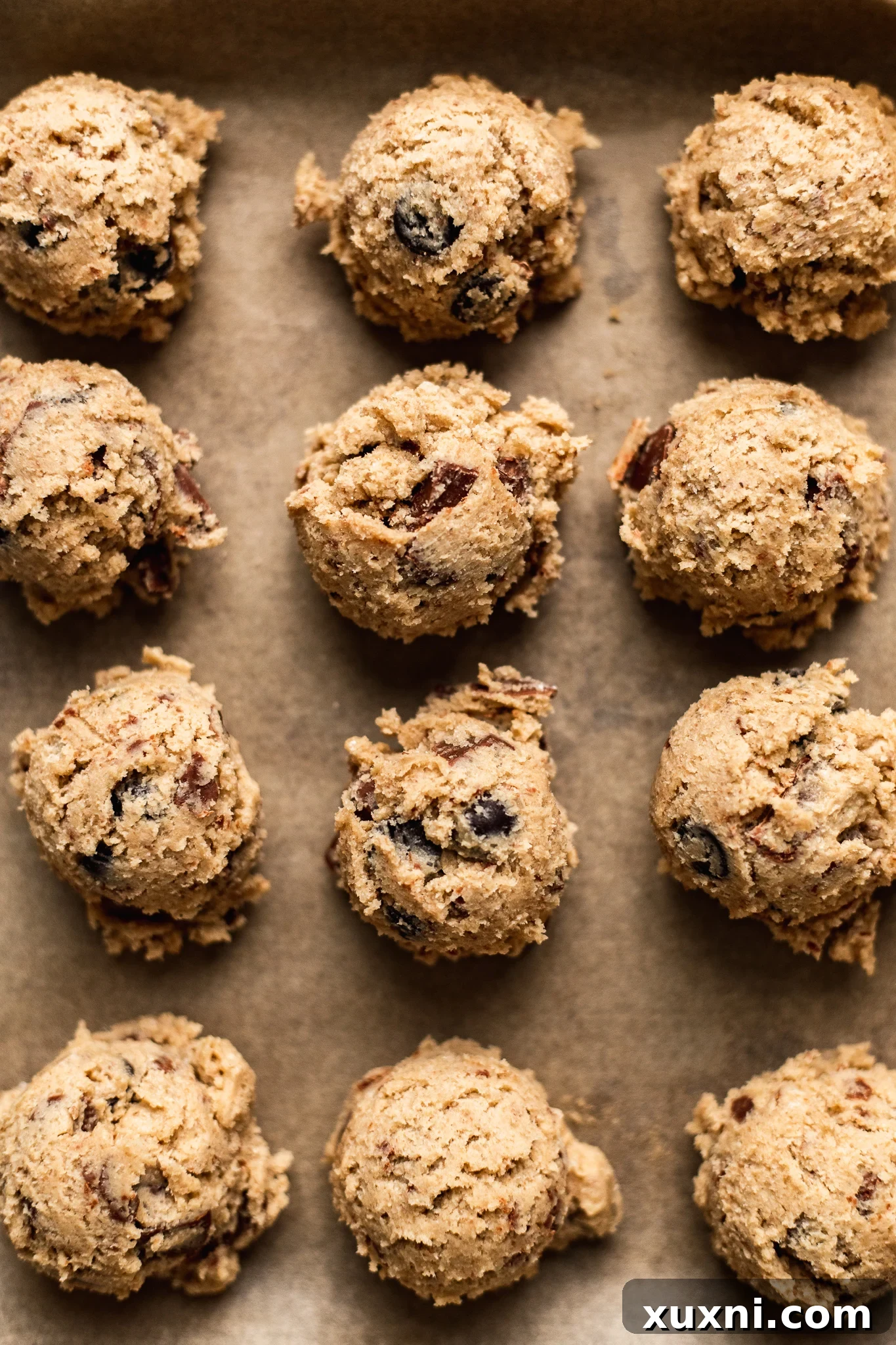 scooped vegan cookie dough balls ready for chilling