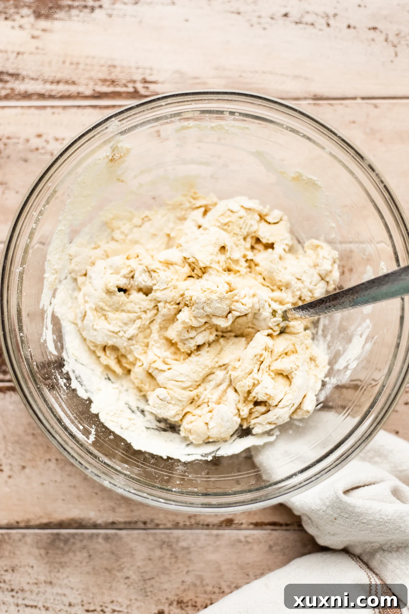 Mixing ingredients for homemade vegan pasta dough.