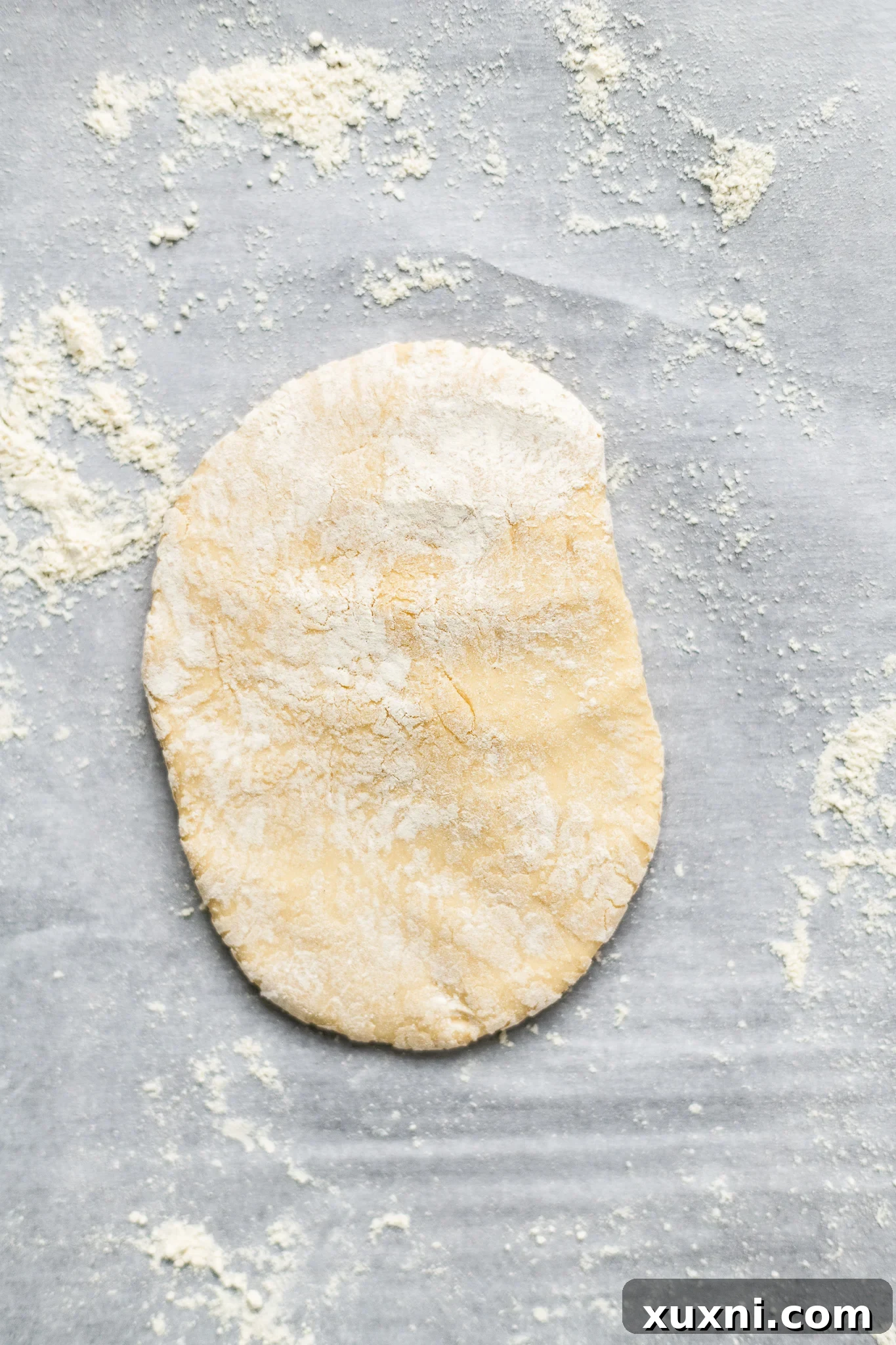 Pasta dough ready for rolling through a pasta machine.