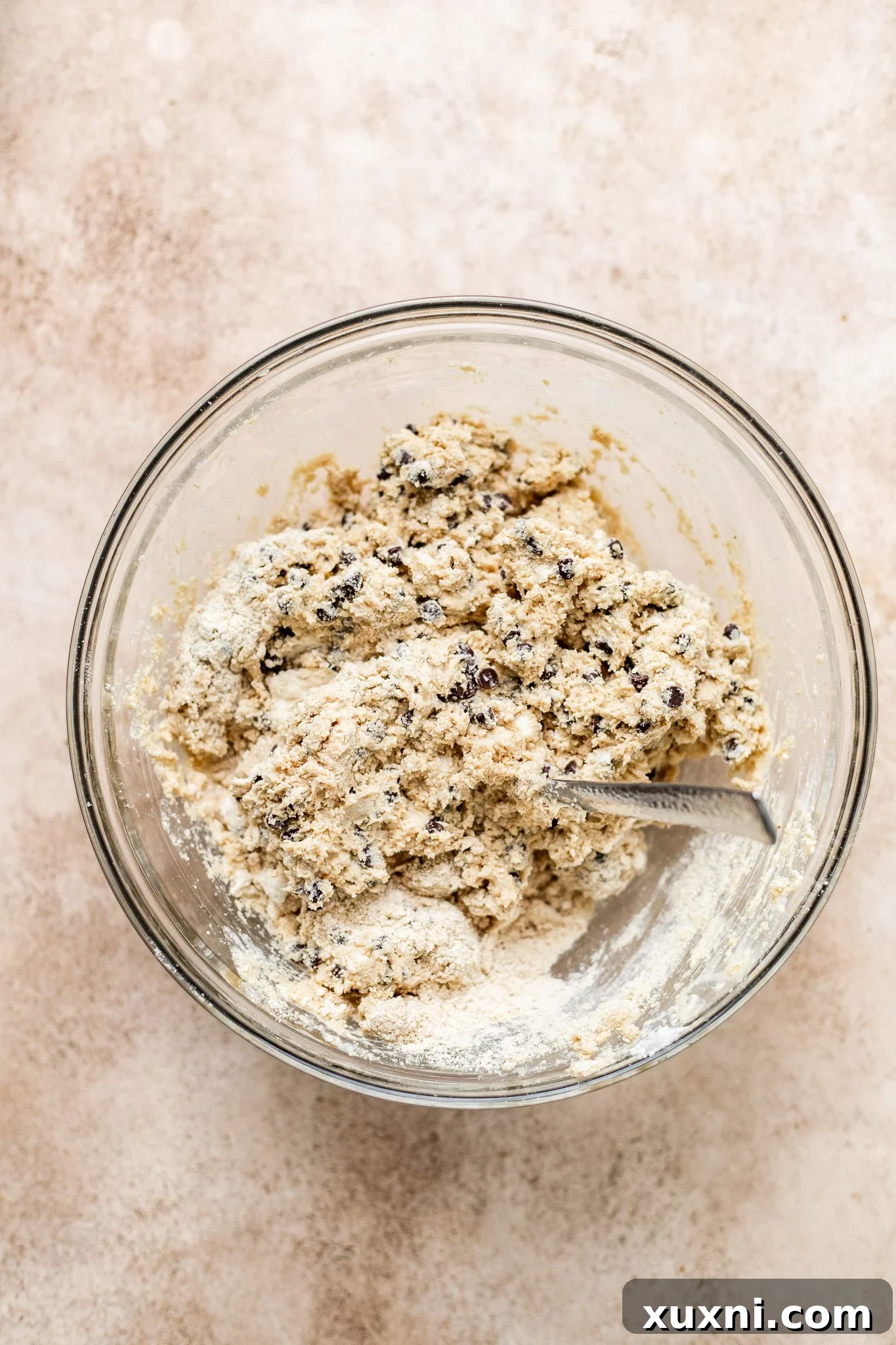 Ultimate Vegan Gluten-Free Chocolate Chip Scones 7 Adding vegan chocolate chips to scone dough