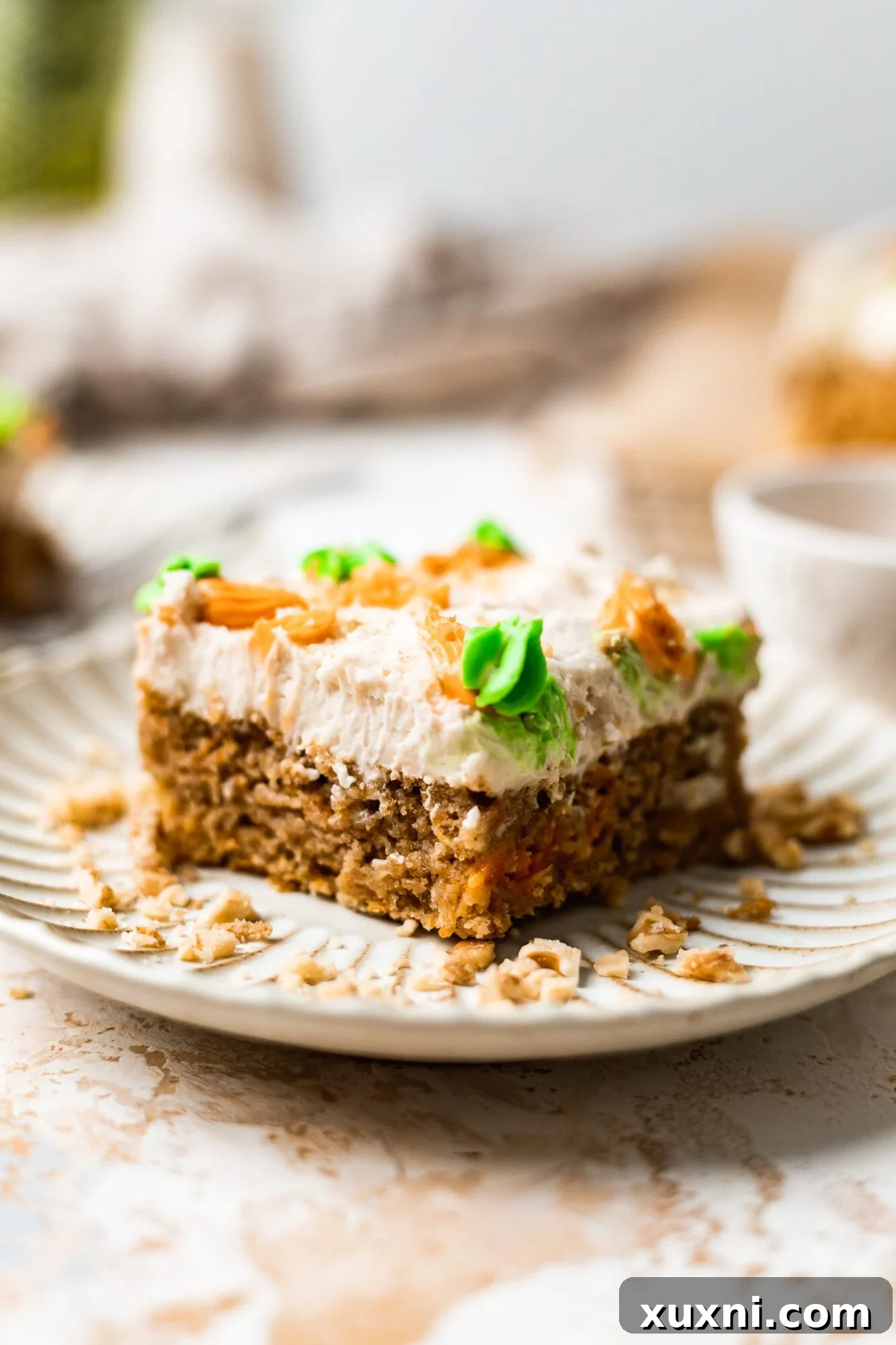 Irresistible Vegan Gluten Free Carrot Cake Bars 3 slice of carrot cake bar on a plate