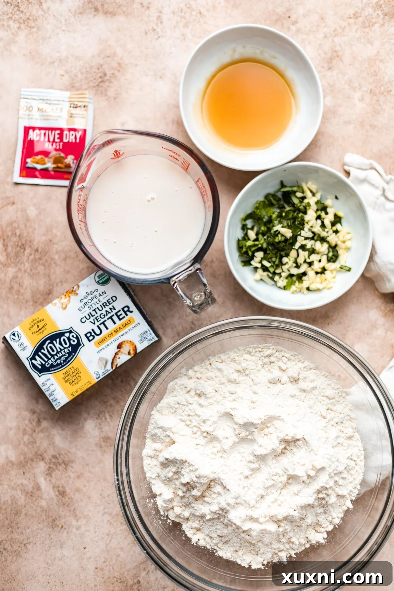 various vegan dinner roll ingredients laid out on a table