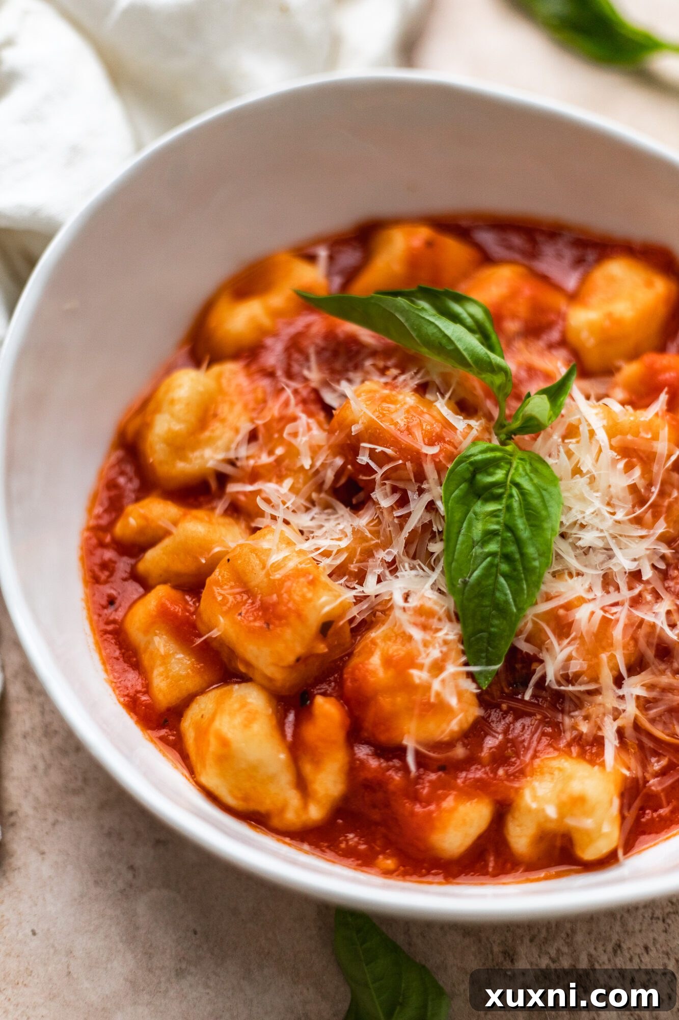 close up of bowl of gnocchi