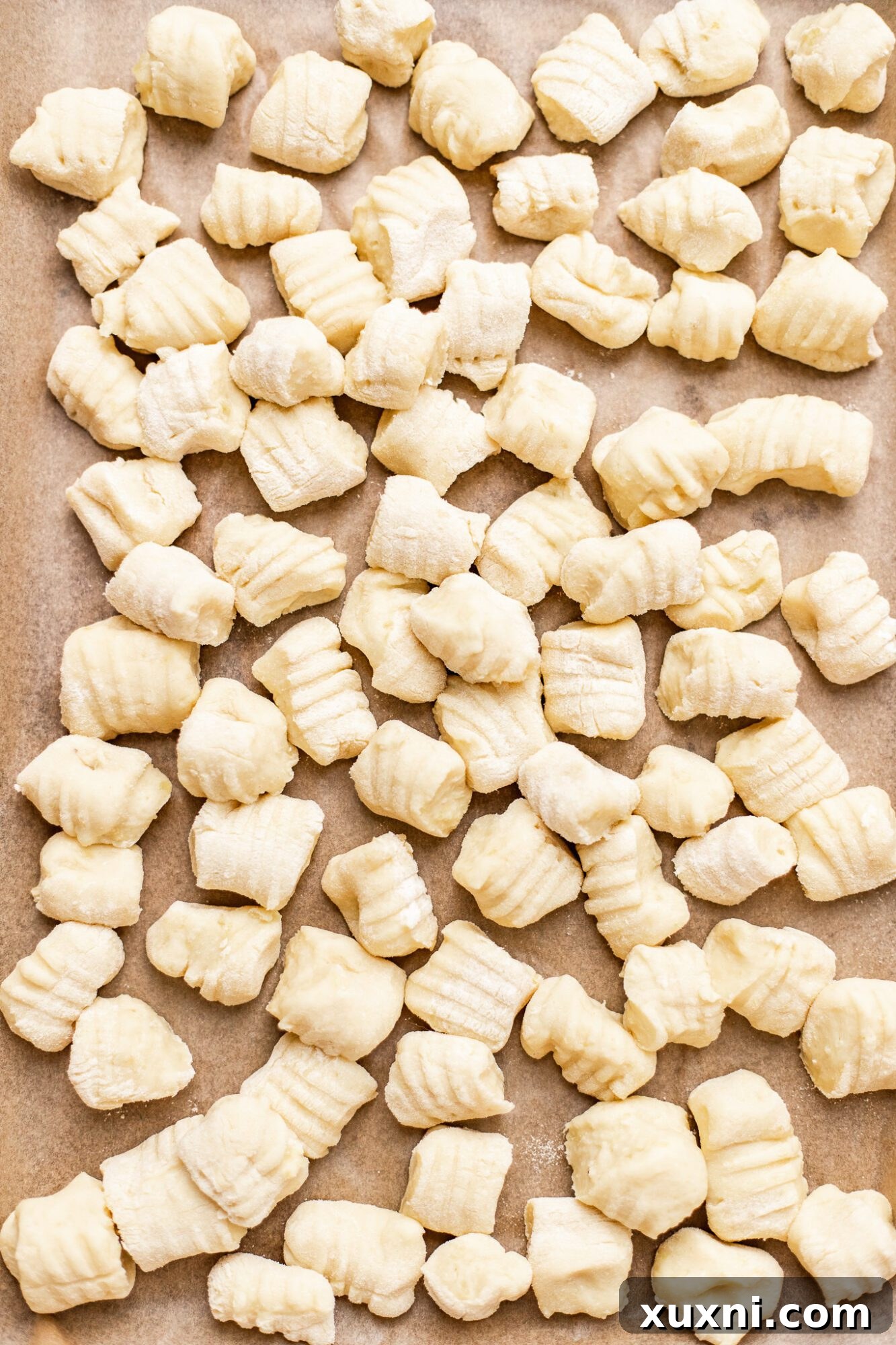 homemade gnocchi on baking sheet