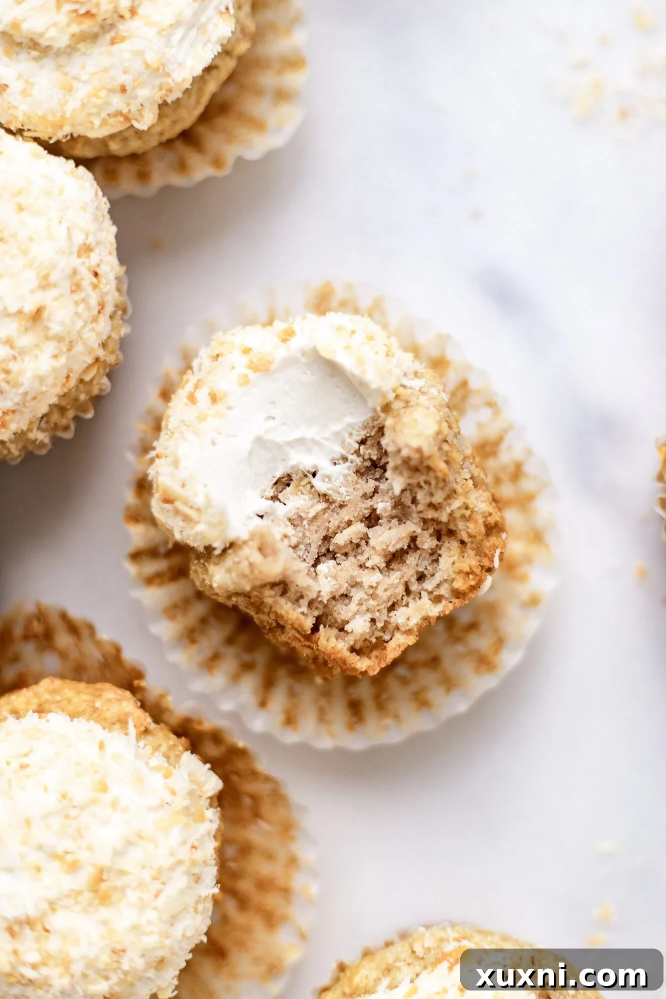 Decadent Vegan Coconut Cupcakes Gluten Free Adaptable 3 bitten vegan coconut cupcake