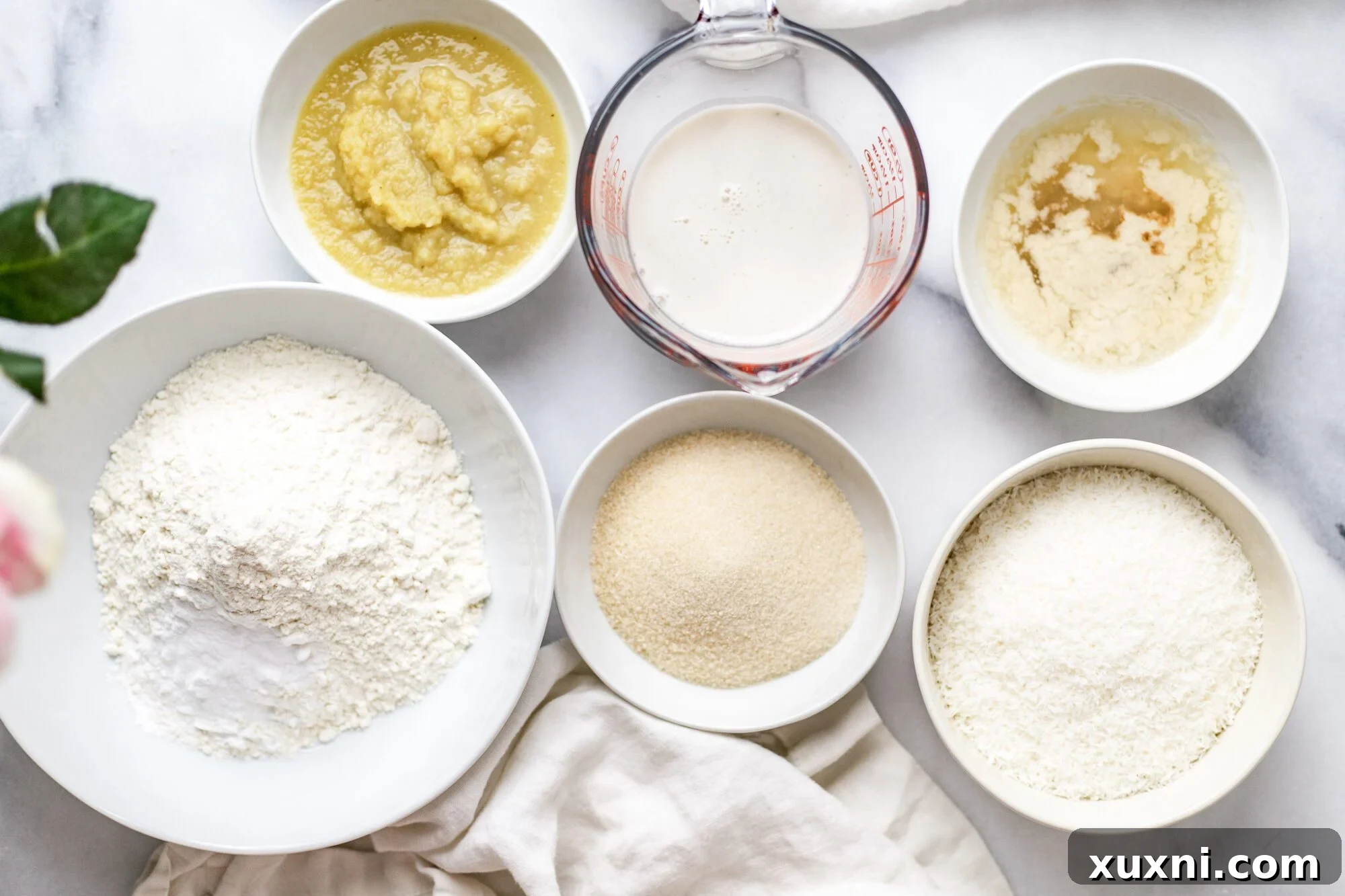 Decadent Vegan Coconut Cupcakes Gluten Free Adaptable 4 vegan coconut cupcake ingredients on marble