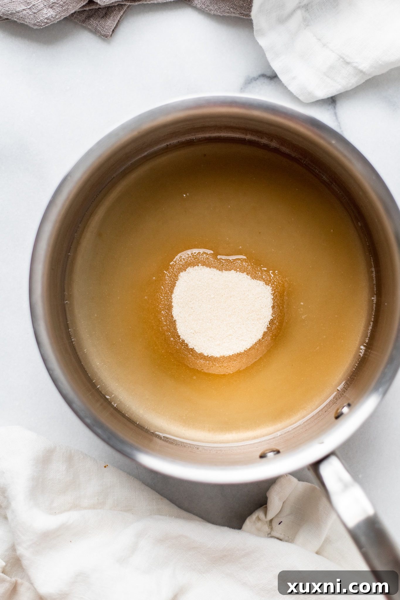 whisking together all lemon curd ingredients