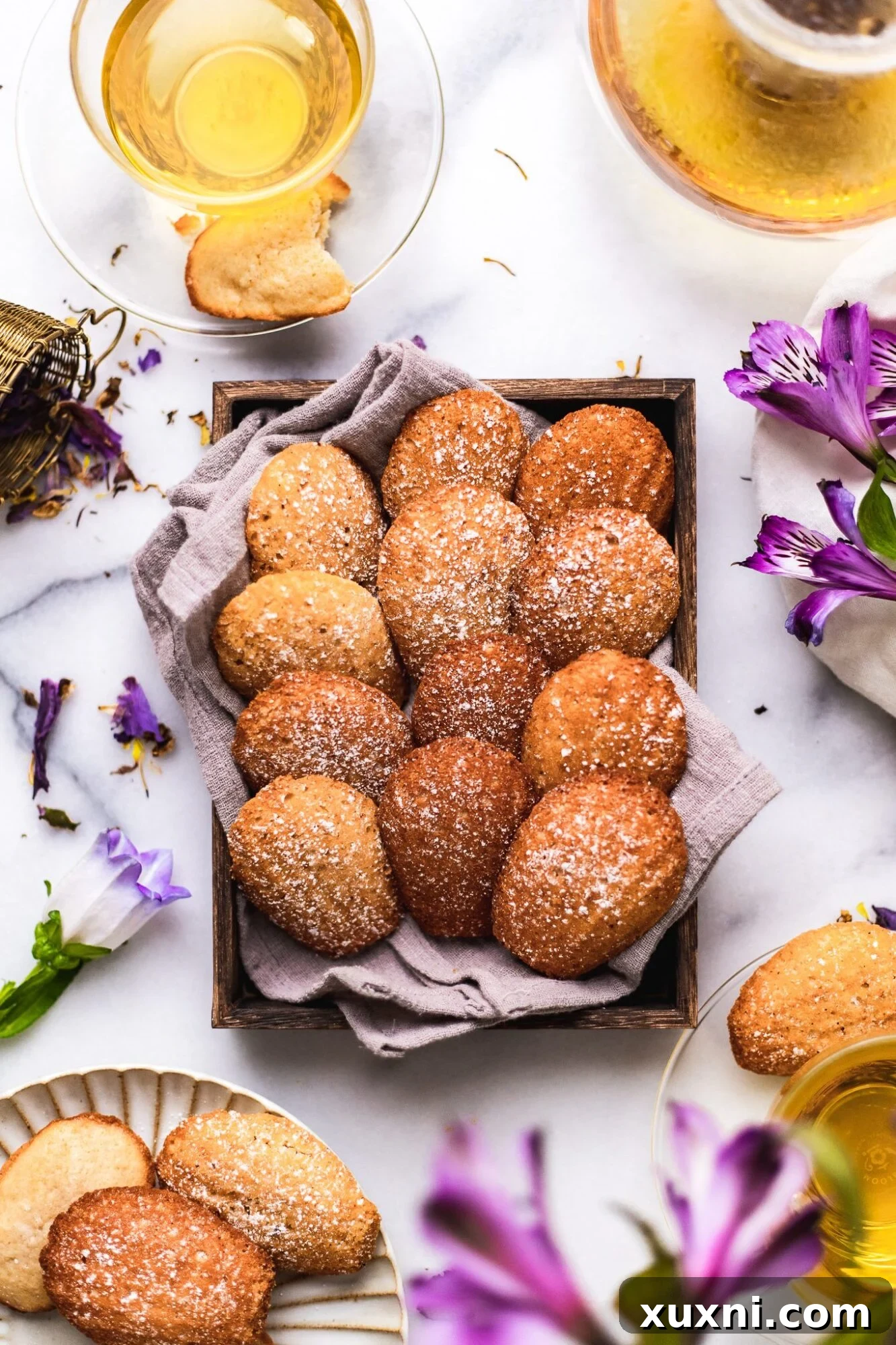 BEST Vegan Madeleines (Easy + Gluten Free Option!) - a close-up of beautifully baked madeleines
