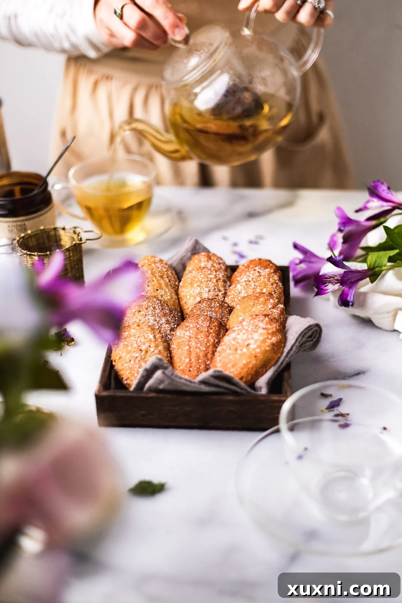 madeleines served with tea - an inviting scene