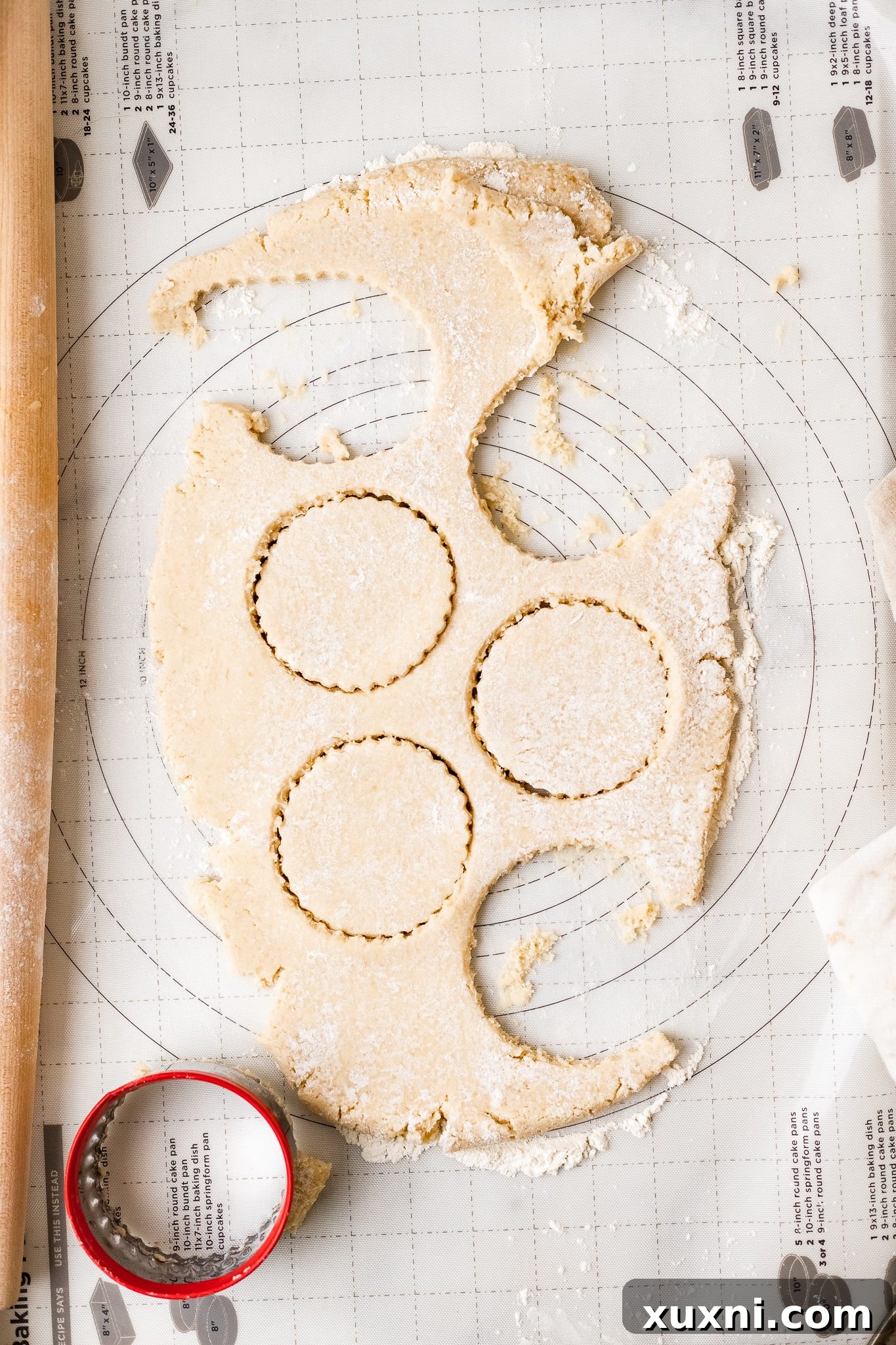 rolling out the cookie dough for vegan Lofthouse cookies