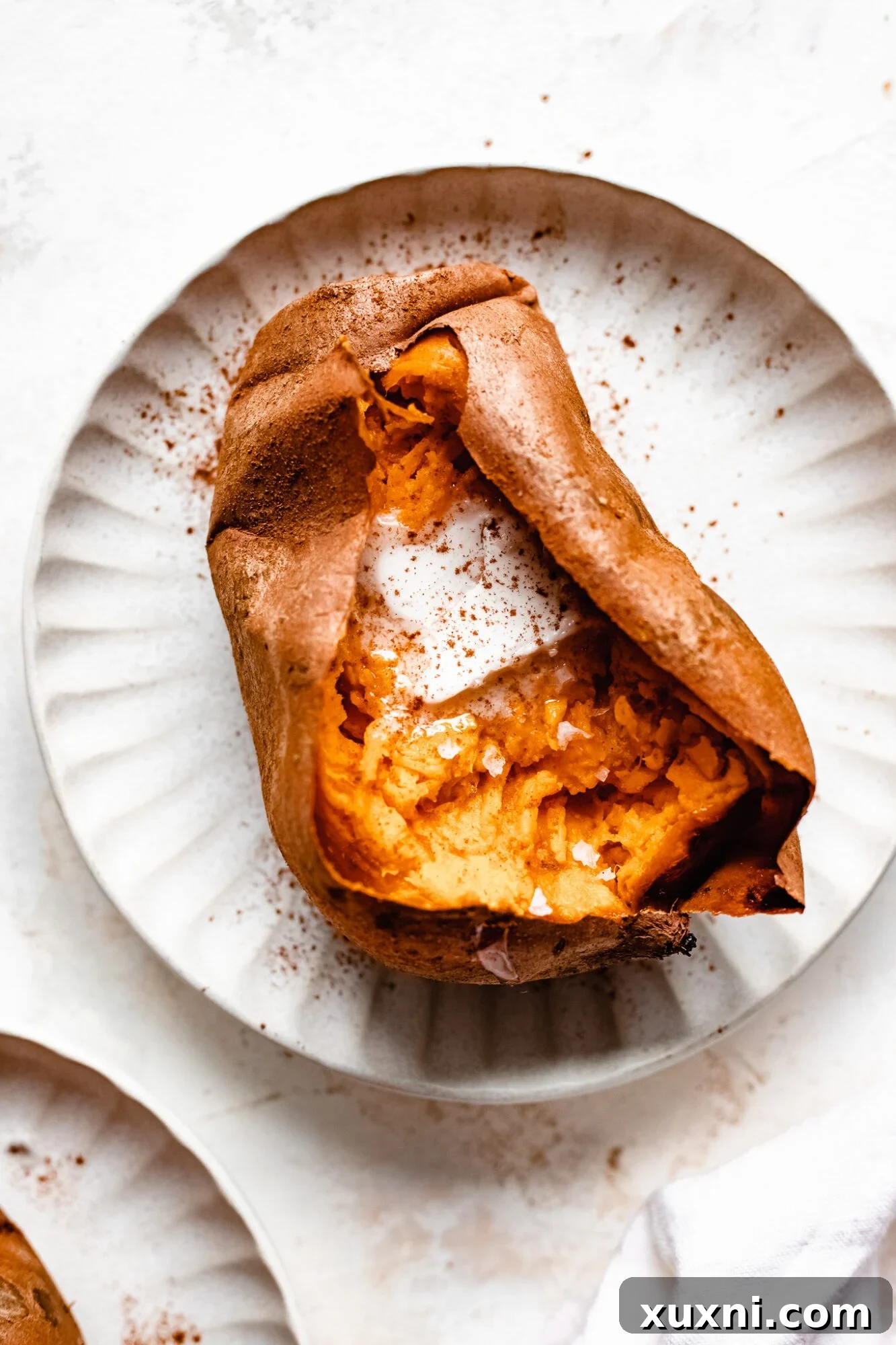 baked sweet potato on plate