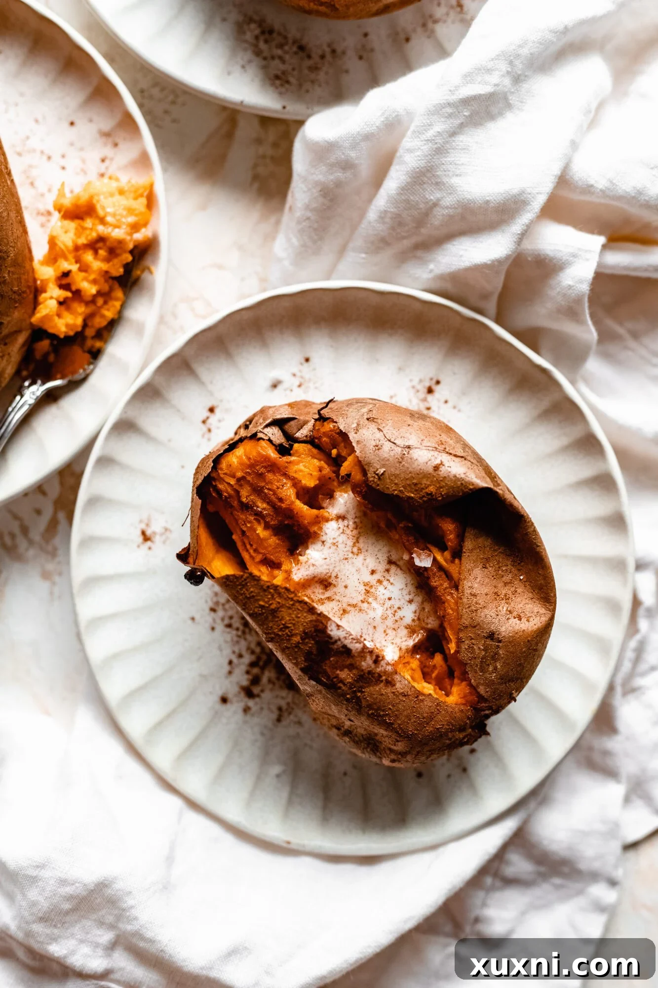 baked sweet potato on white plate