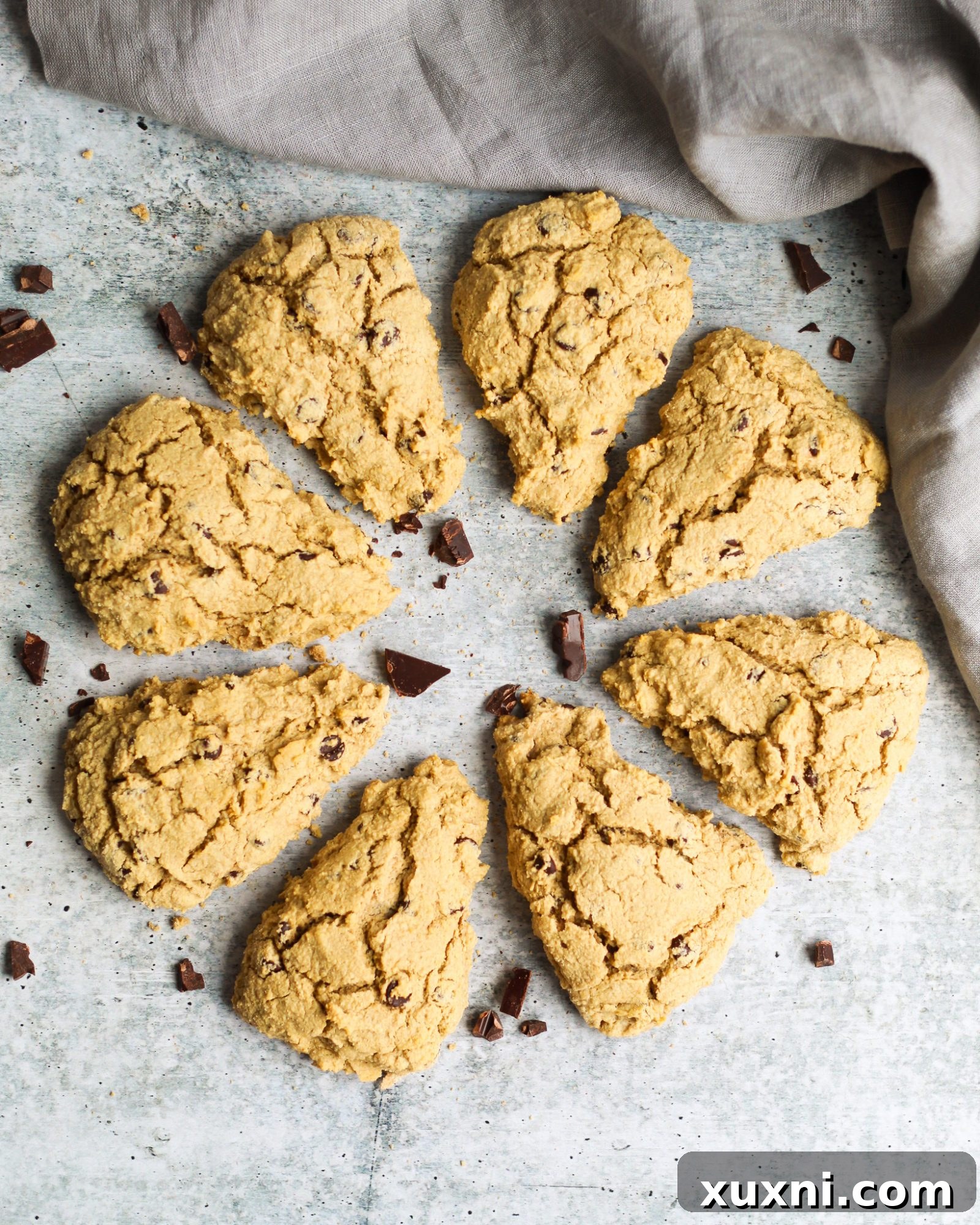 Close-up of healthy chocolate chip scones arranged in a circle, showcasing their flaky texture and melted chocolate chips