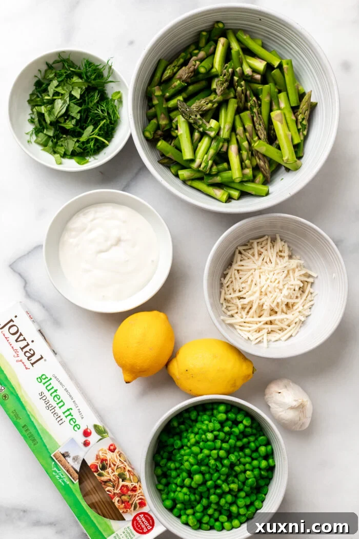 lemon and asparagus pea pasta ingredients on marble
