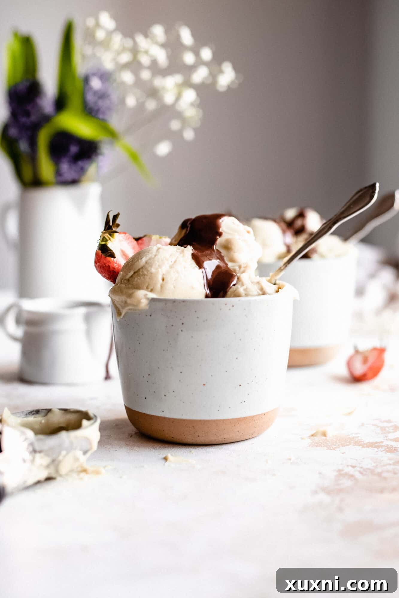 A beautifully arranged vegan vanilla ice cream sundae