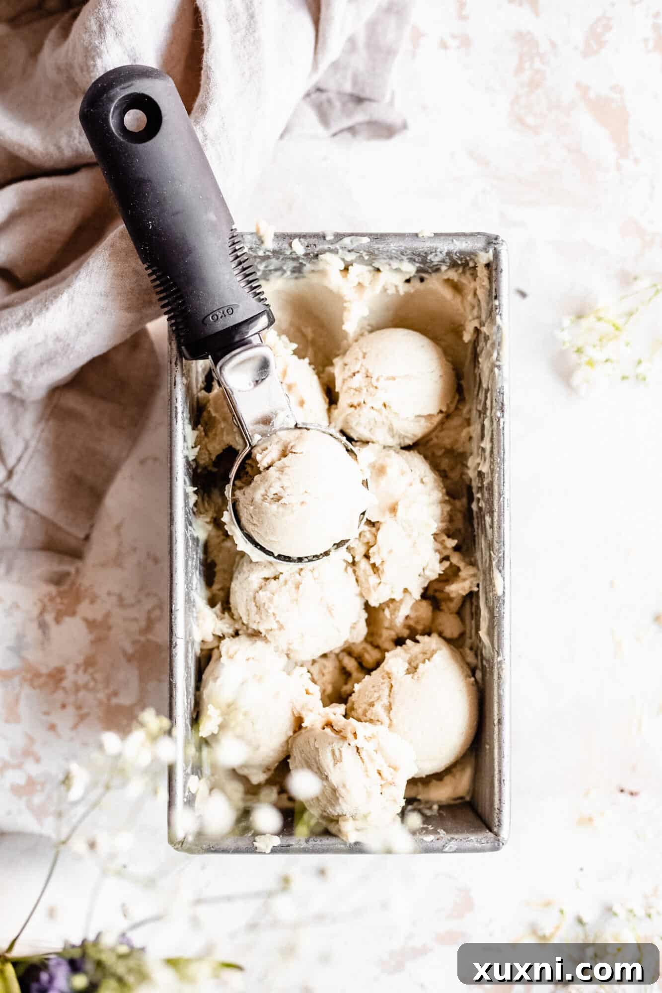 Scoops of paleo no-churn ice cream showcasing its smooth texture