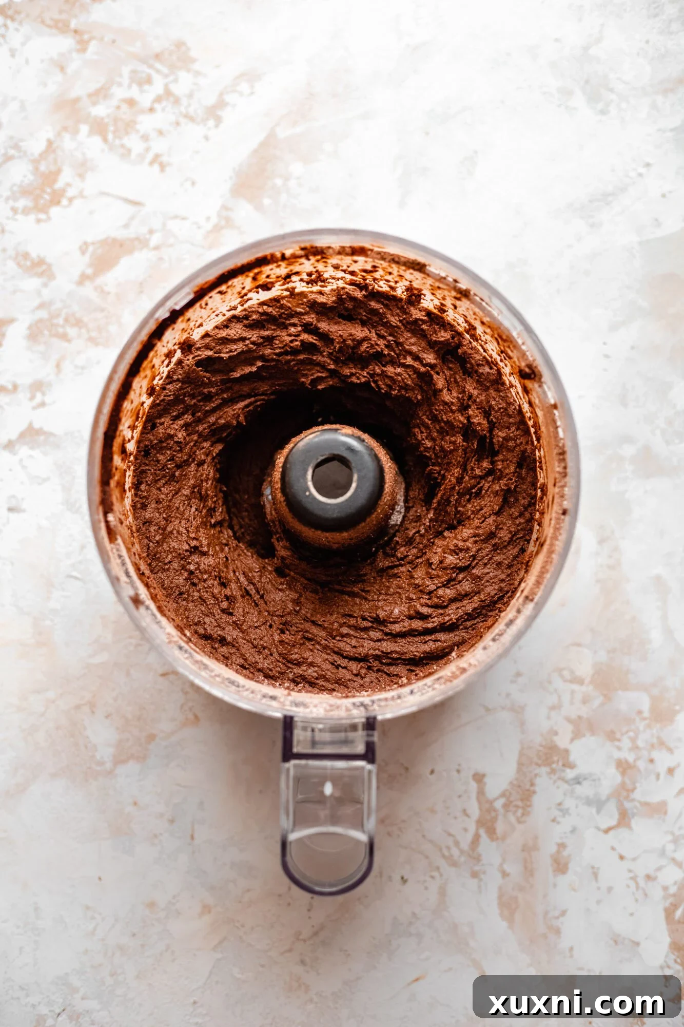 smooth, blended brownie ingredients in a food processor