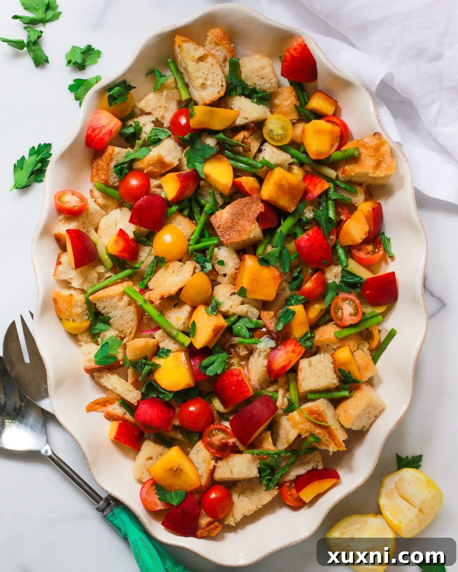 Panzanella salad with peaches and tomatoes