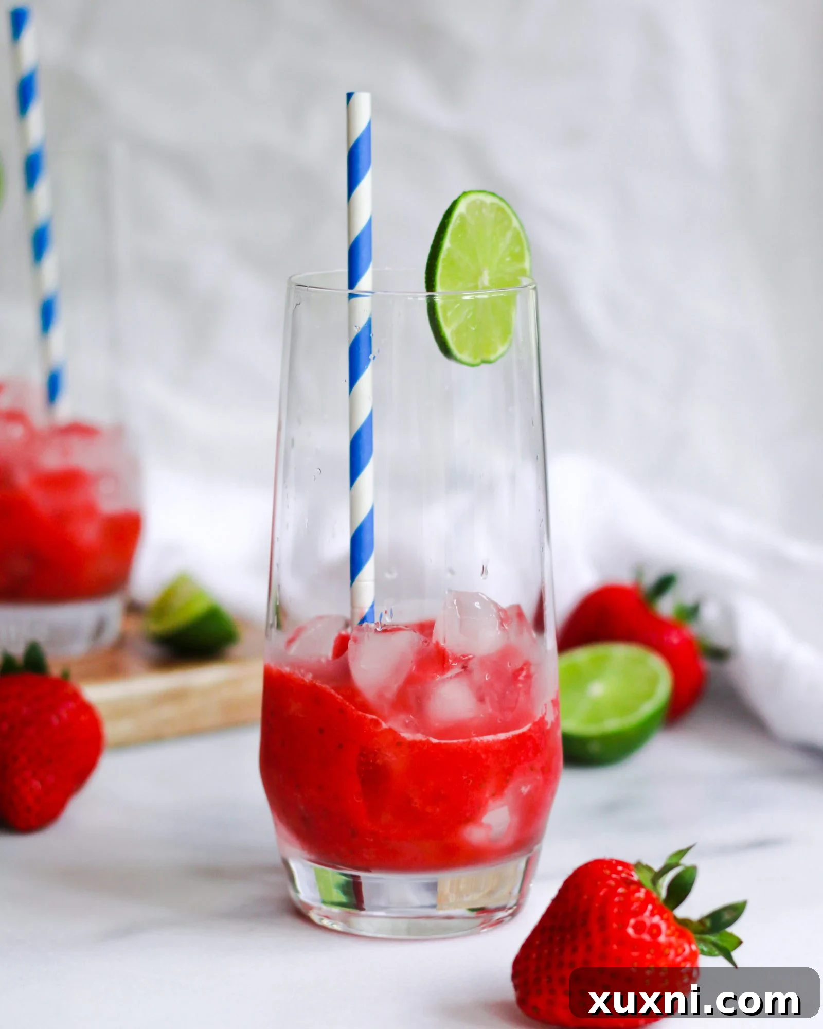 Blushing Berry Mockarita 7 Strawberry puree spooned over crushed ice in a glass, forming the delicious base of a virgin margarita.