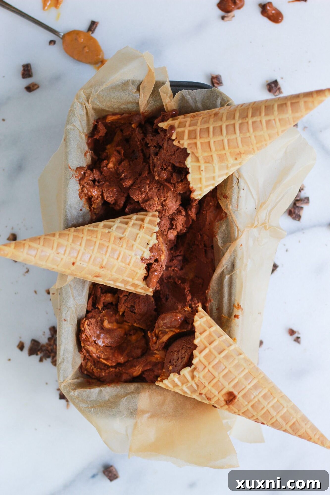 ice cream tin with chocolate peanut butter nice cream cones