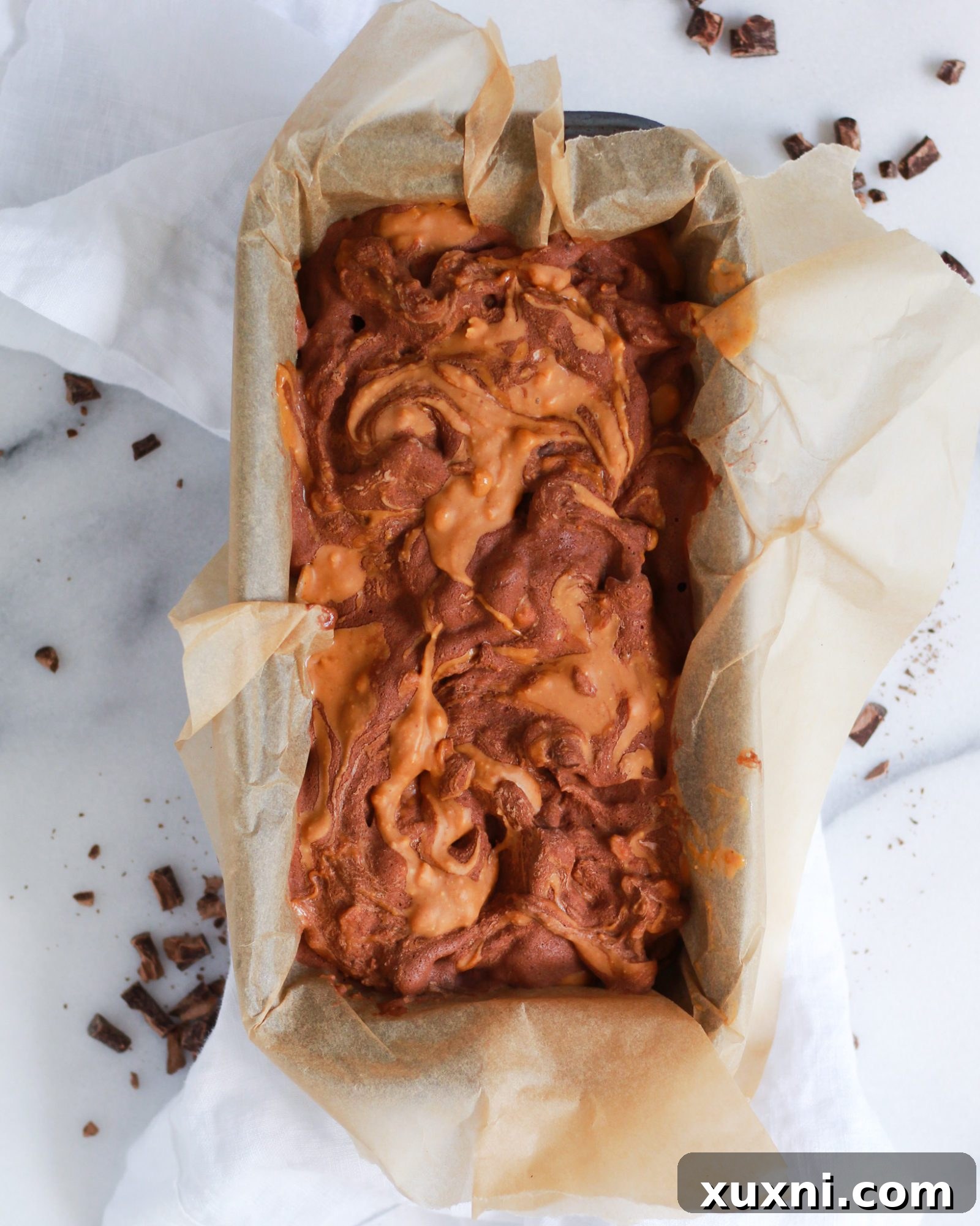 swirl of peanut butter in chocolate nice cream