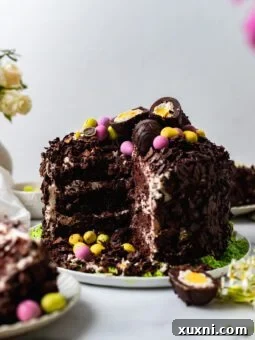 sliced chocolate Easter egg cake on a plate