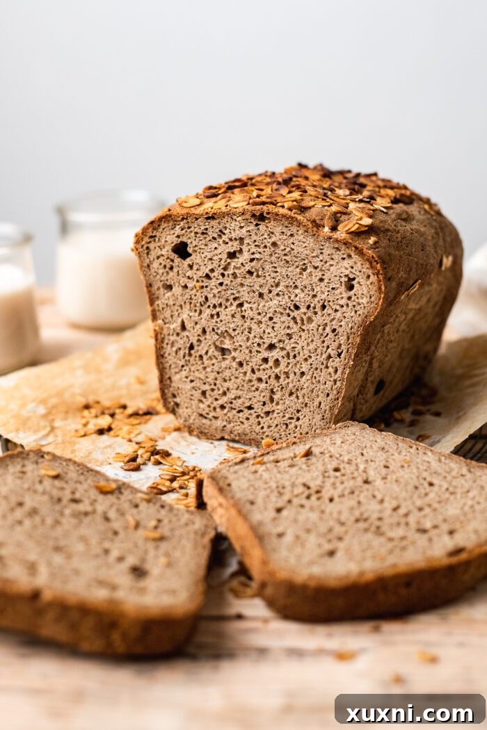 Your Perfect Gluten-Free Sandwich Bread: Homemade, Egg & Dairy-Free 12 Slices of golden-brown gluten-free sandwich bread cooling on a wire rack, ready for storage or serving.