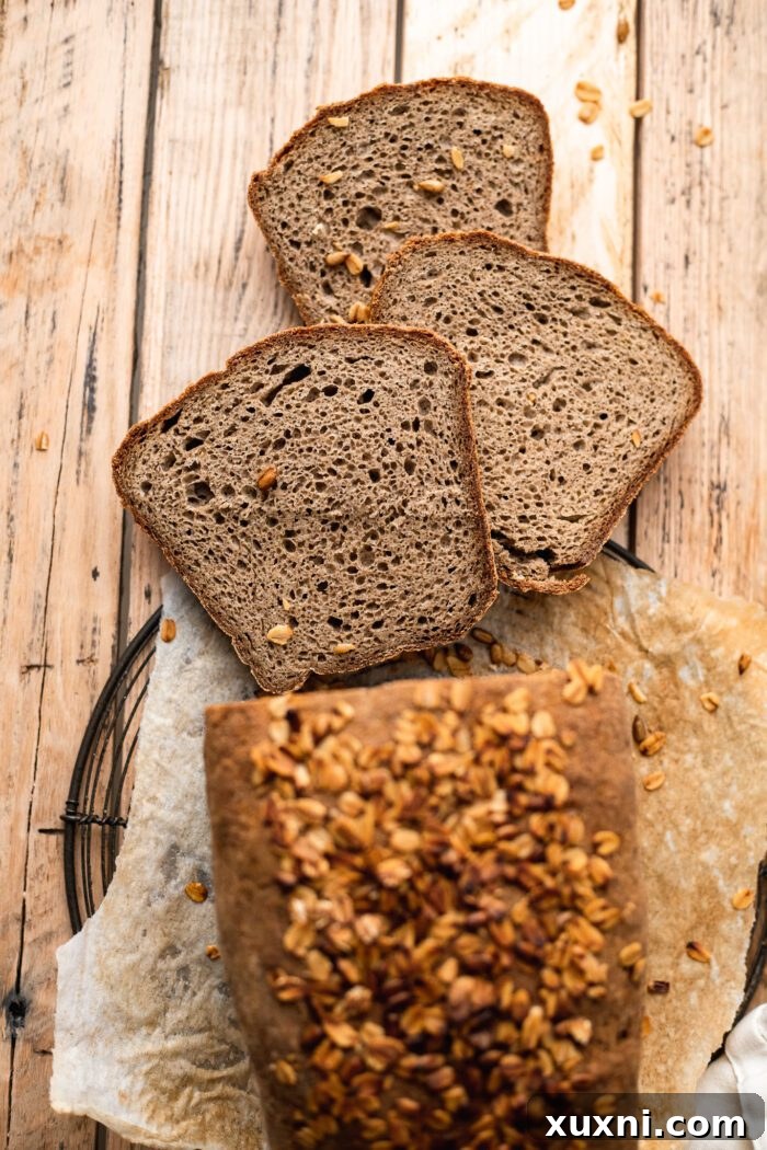 Your Perfect Gluten-Free Sandwich Bread: Homemade, Egg & Dairy-Free 4 Close-up of a freshly sliced gluten-free sandwich bread loaf, showing its consistent texture and even crumb.