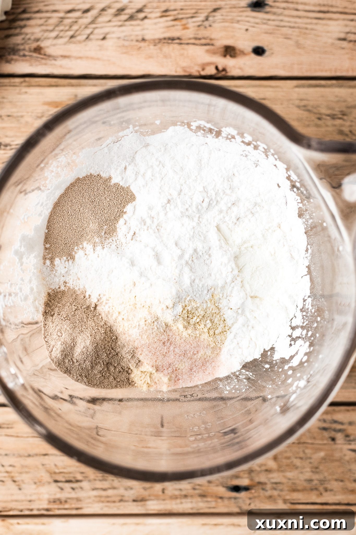 Dry ingredients for gluten free pizza dough in a bowl
