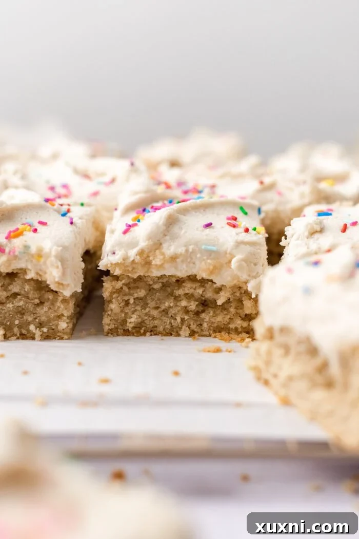 Easy & Delicious Vegan Vanilla Sheet Cake 4 multiple slices of vanilla sheet cake presented beautifully