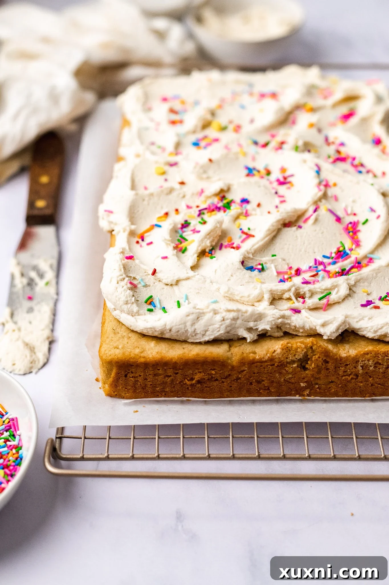 Easy & Delicious Vegan Vanilla Sheet Cake 8 sheet cake frosted with creamy white frosting