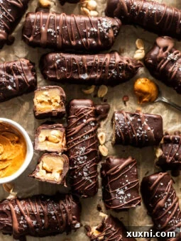 vegan snickers bars on parchment paper