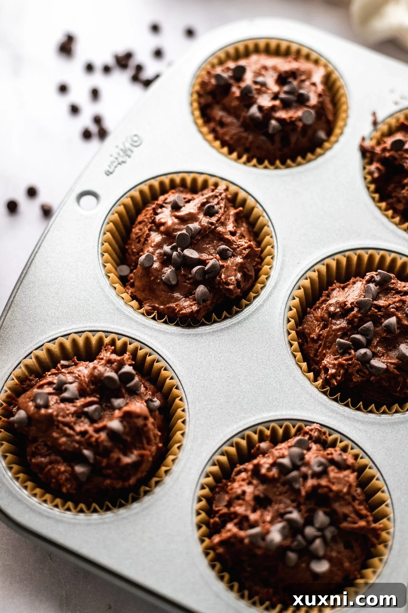 muffin batter in tins