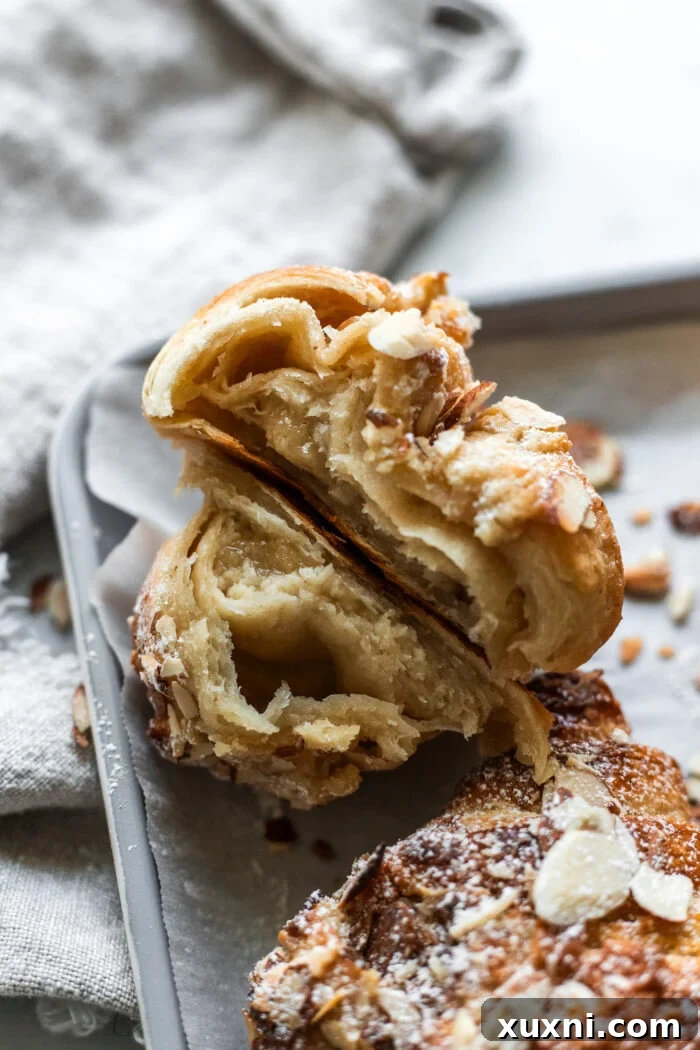 almond croissants with filling oozing out