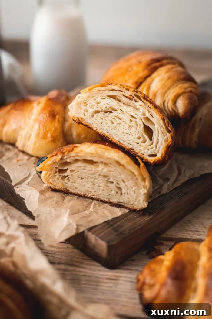 sliced vegan croissants stacked on top of each other