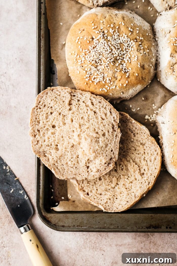 sliced open burger bun ready for filling