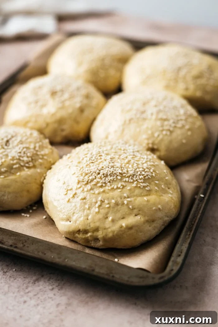 gluten free burger buns sprinkled with sesame seeds