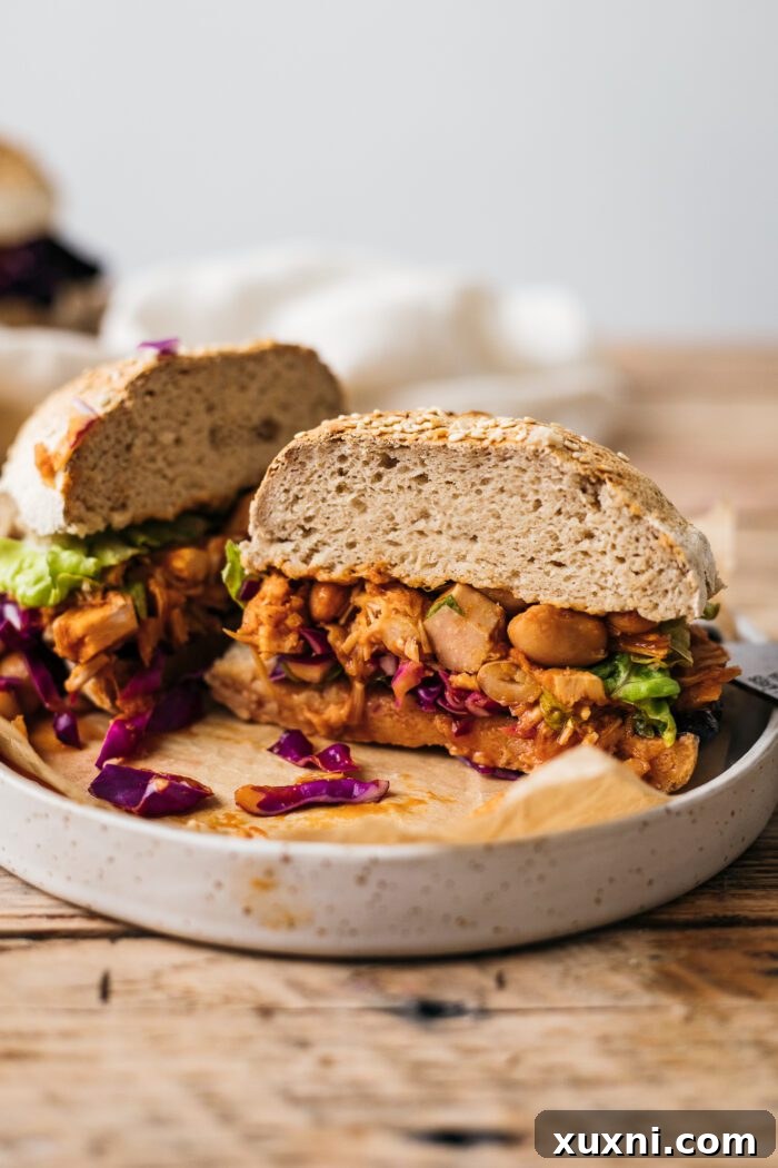 sliced open vegan pulled pork sandwich