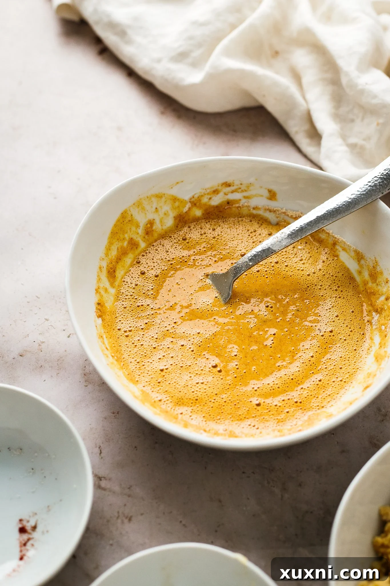 whisked scramble liquid with spices and chickpea flour