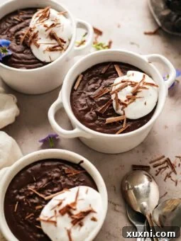 pots of vegan chocolate pudding on a table