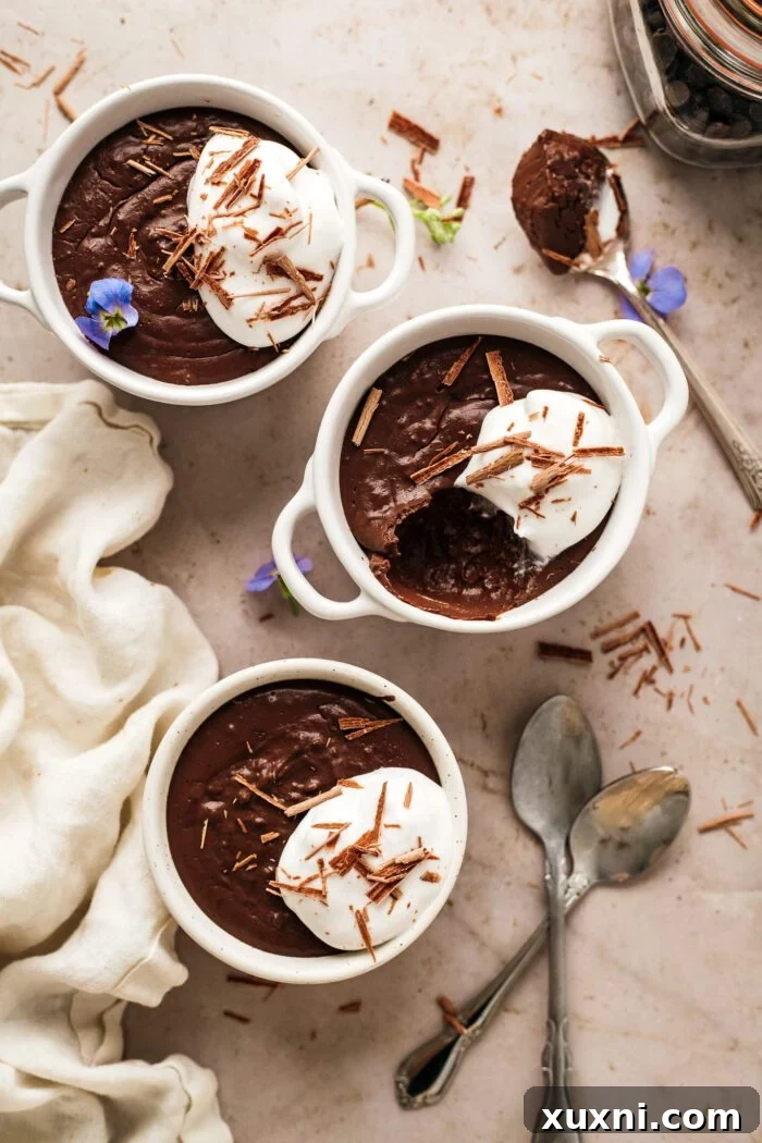Quick and Easy Vegan Chocolate Pudding Dream 8 Small glass pots of freshly made vegan chocolate pudding cooling, ready for chilling.