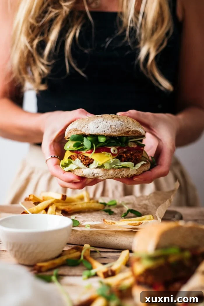 hands holding veggie burger