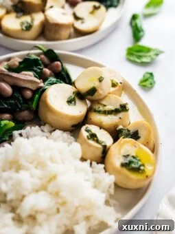 close up of vegan scallops on a plate with rice and beans