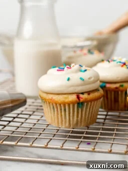 vegan funfetti cupcakes on cooling rack
