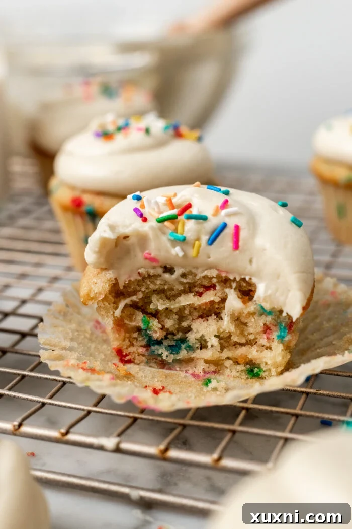 Vegan Funfetti Cupcakes Perfectly Moist for Four Days 5 sliced vegan funfetti cupcake