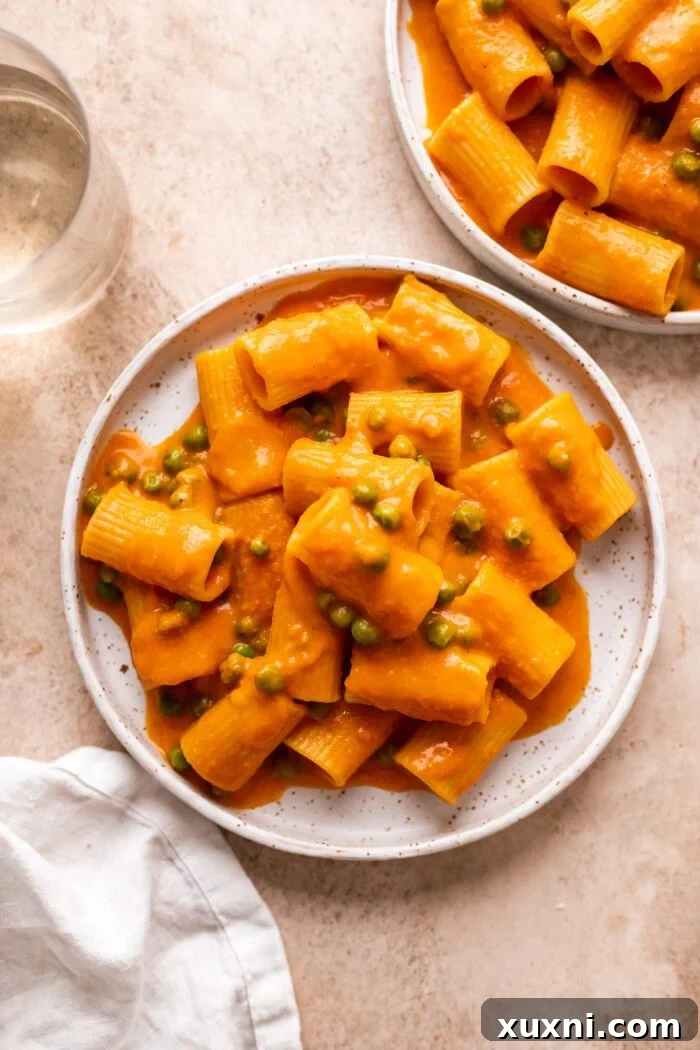 Delightful vegan vodka pasta dish on a plate, showcasing its rich and creamy texture.